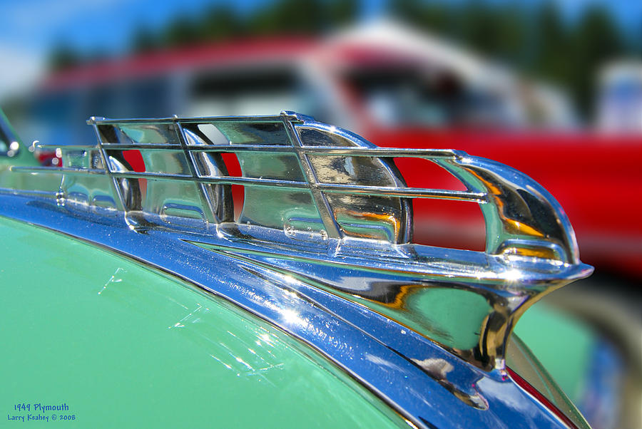 1949 Plymouth Hood Ornament Photograph by Larry Keahey