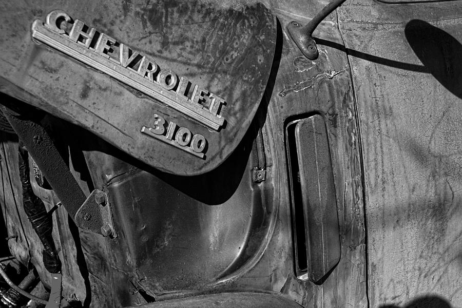 Truck Photograph - 1950 Chevrolet Truck Emblem Black and White by Nick Gray