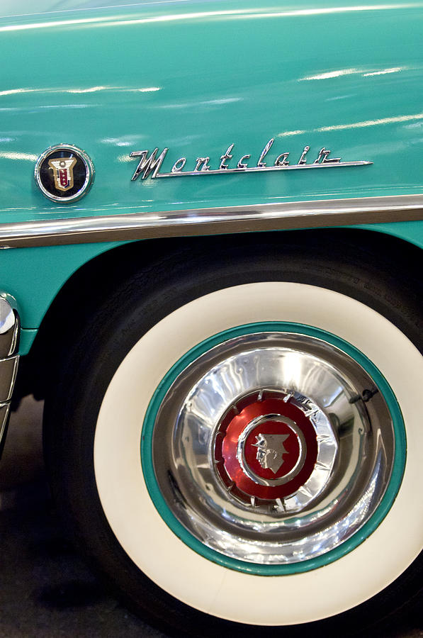 1951 Mercury Montclair Convertible Wheel Emblem Photograph by Jill Reger