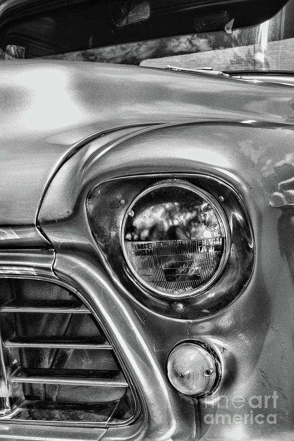 1955 Chevy Pick Up Truck Headlight in black and white Photograph by Paul Ward