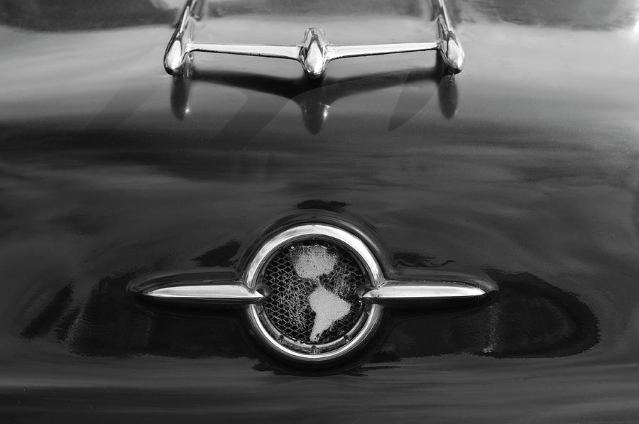 Black And White Photograph - 1955 Oldsmobile Holiday 88 Hood Ornament 2 by Jill Reger