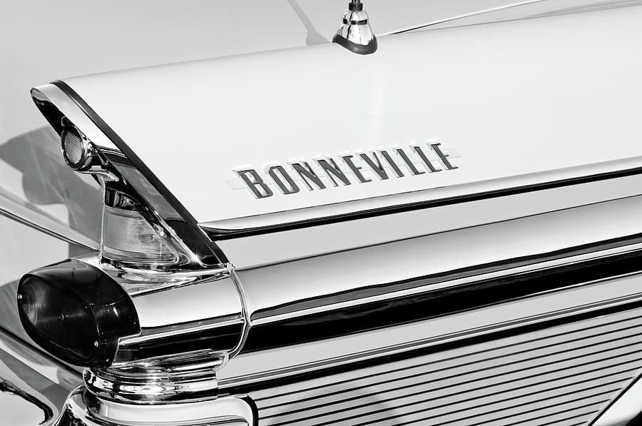 1957 Pontiac Bonneville Taillight Emblem -0106bw Photograph by Jill Reger