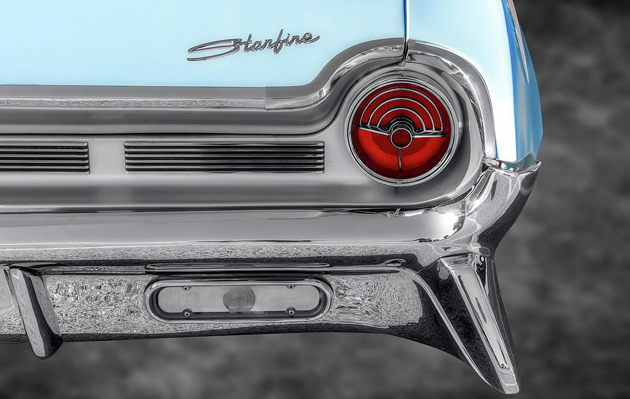 1961 Oldsmobile Starfire Convertible Taillight and Logo Detail Photograph by Frank J Benz