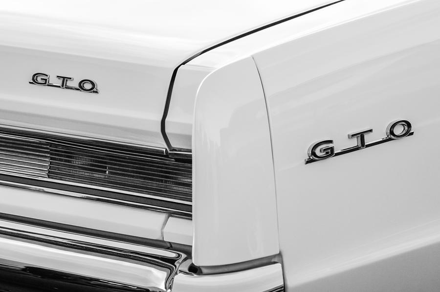 1964 Pontiac GTO Tail Light Emblems -0174bw Photograph by Jill Reger