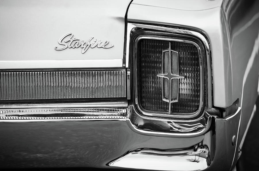 1965 Oldsmobile Starfire Taillight Emblem -0212bw Photograph by Jill Reger