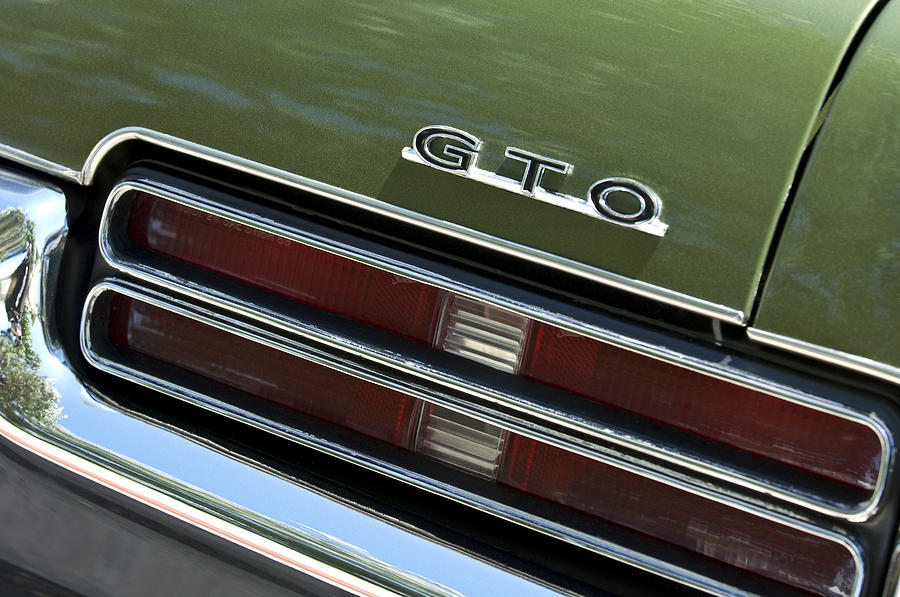 1969 Pontiac GTO Taillight Emblem Photograph by Jill Reger