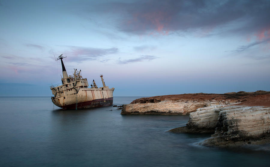 Abandoned Ship on a rocky coast #1 Photograph by Michalakis Ppalis