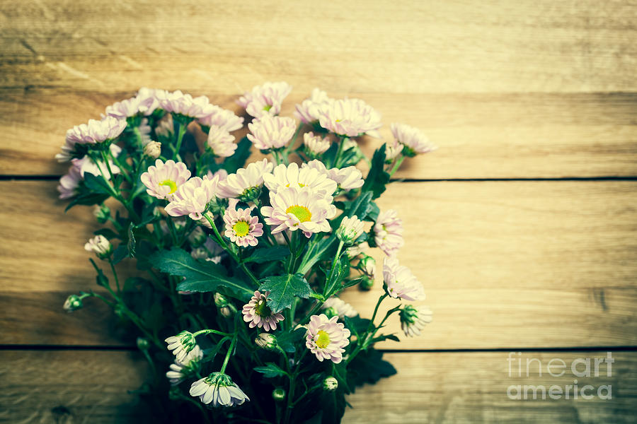 Bouquet of fresh spring flowers on rustic wood Photograph by Michal ...