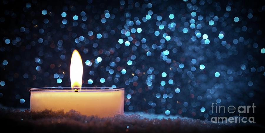 Chistmas candle glowing on glitter background. #2 Photograph by Michal Bednarek