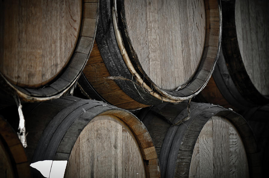 Dark Wine Barrels to store vintage wine #2 Photograph by Brandon Bourdages