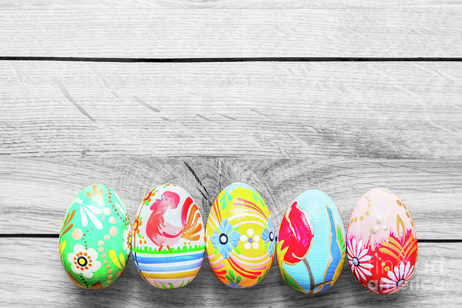Easter handmade eggs on wooden table. #2 Photograph by Michal Bednarek