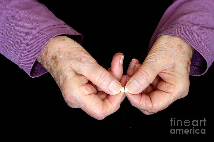 Elderly Hands Break A Pill #2 Photograph by Scimat