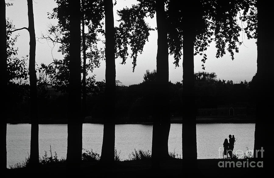 Family Silhouetted by Lake #2 Photograph by Jim Corwin