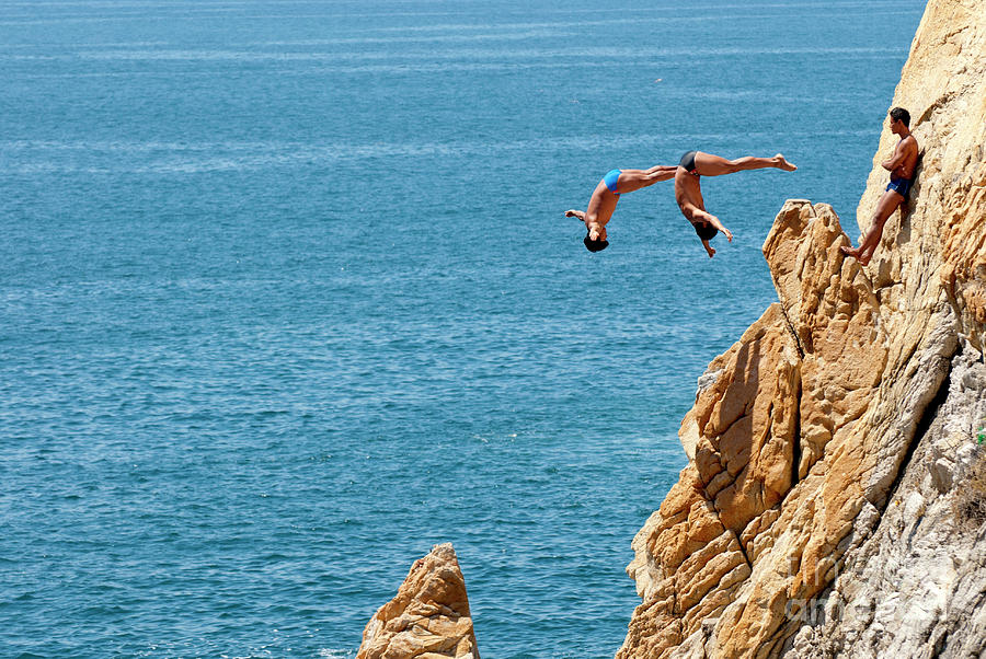 Famous cliff diver of Acapulco Mexico #2 Photograph by Anthony Totah