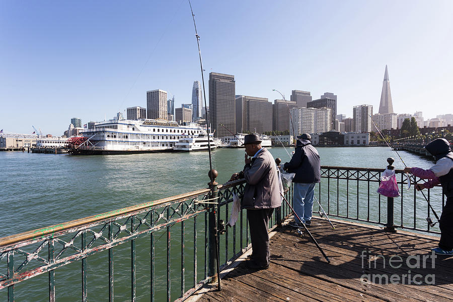 Fisherman in San Francisco Embarcadero on a sunny day #2 Photograph by Didier Marti