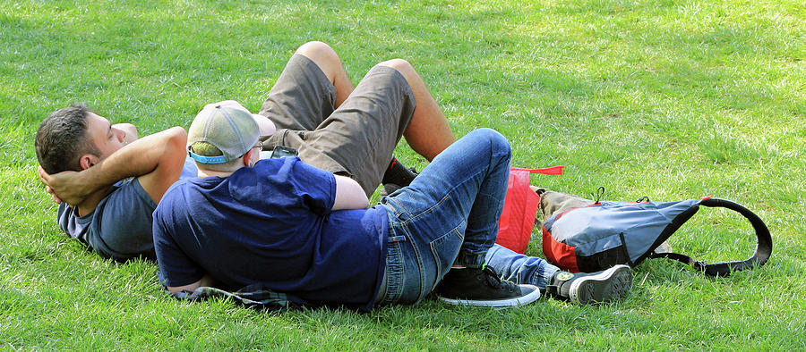 2 Guys On The Grass Photograph by Cora Wandel