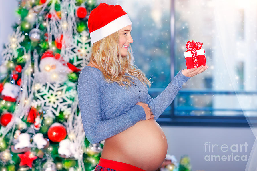 Happy pregnant woman in Christmas eve #2 Photograph by Anna Om