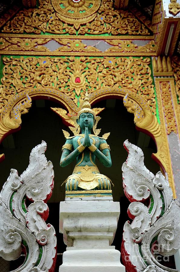 Hindu deity greets at Buddhist temple Chiang Mai Thailand #3 Photograph by Imran Ahmed