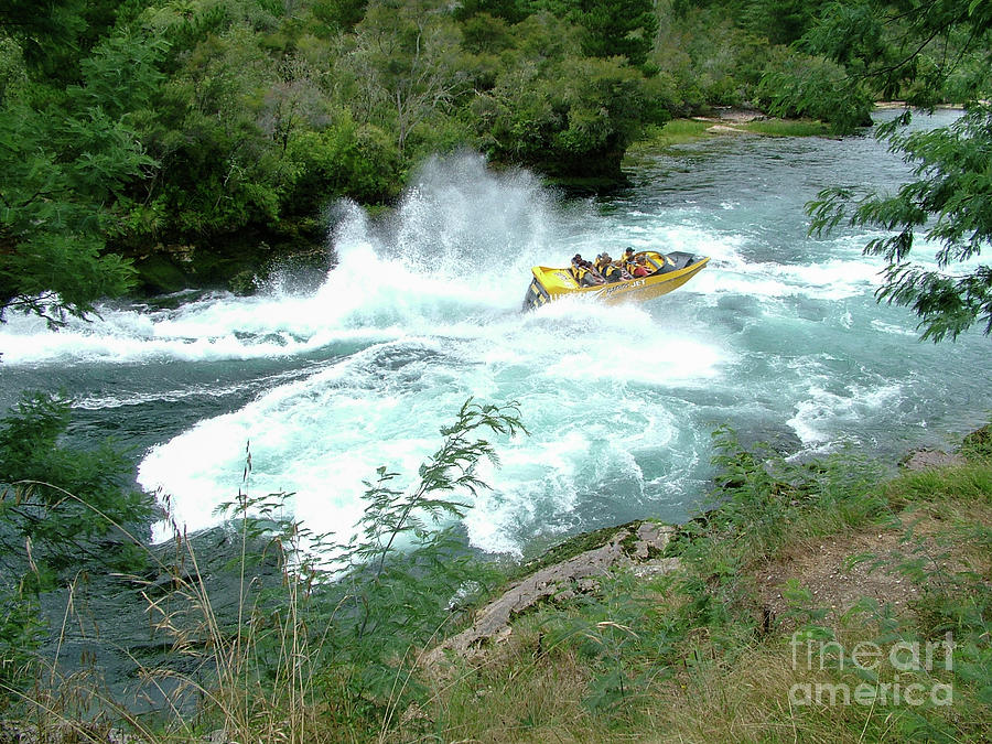 View on river with jet boat on rapids Photograph by Patricia Hofmeester