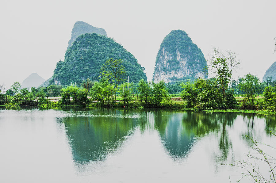 Karst mountains and rural scenery #2 Photograph by Carl Ning