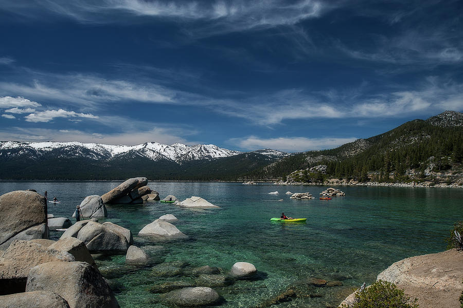 Lake Tahoe scene with puffy clouds and snow on mountains #2 Photograph by Dan Friend