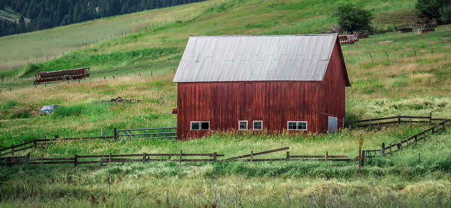landscape with a red barn in rural Montana and Rocky Mountains Photograph