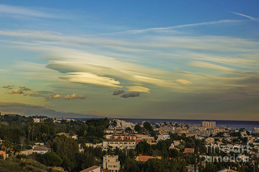 Lenticular clouds #2 Photograph by Rod Jones