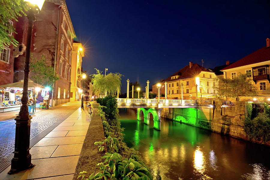 Ljubljanica river waterfront in Ljubljana evening view Photograph by ...