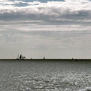 Seascape Photograph - 2-mastship At The Horizon by PJ Steinmeijer