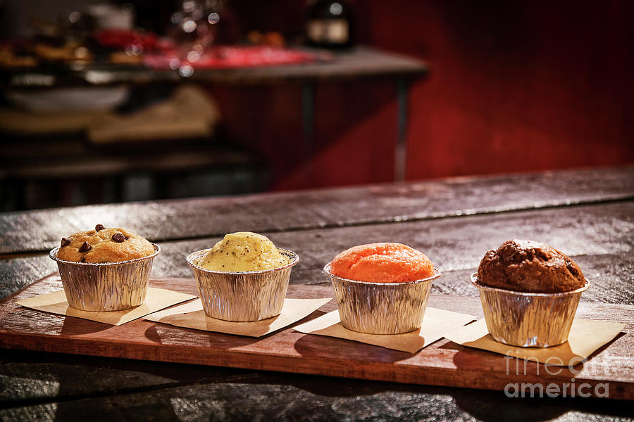 Mixed Freshly Baked Muffins In Cozy Coffeeshop Interior #2 Photograph by JM Travel Photography