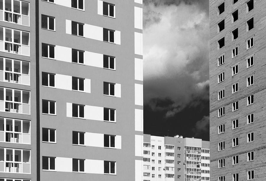 Monochrome Modern Housing Blocks and Brooding Sky #2 Photograph by John Williams