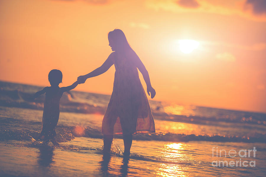 Mother With Her Daughter On The Beach Photograph By Sasin Tipchai Fine Art America 8446