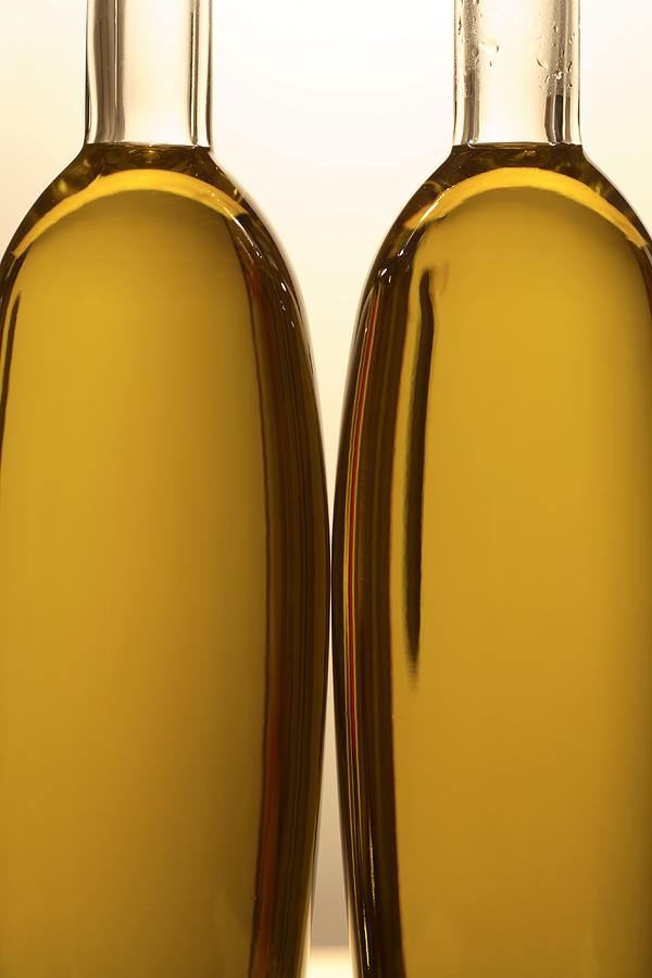 2 Olive Oil Bottles Photograph by Frank Tschakert