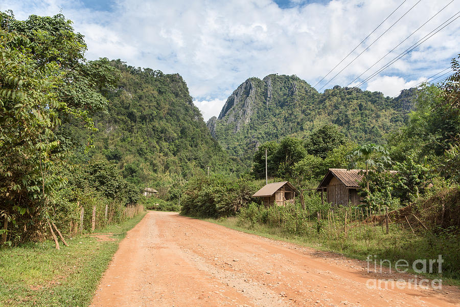 On the road in Laos #2 Photograph by Didier Marti