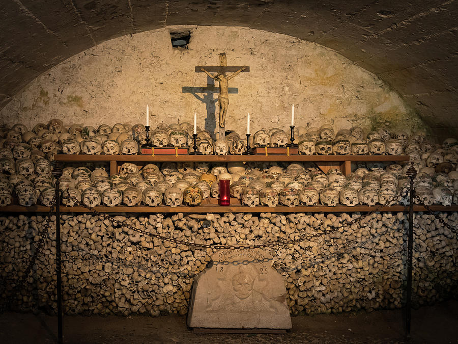 Halloween Photograph - Painted skulls with names, candles and cross #2 by Stefan Rotter