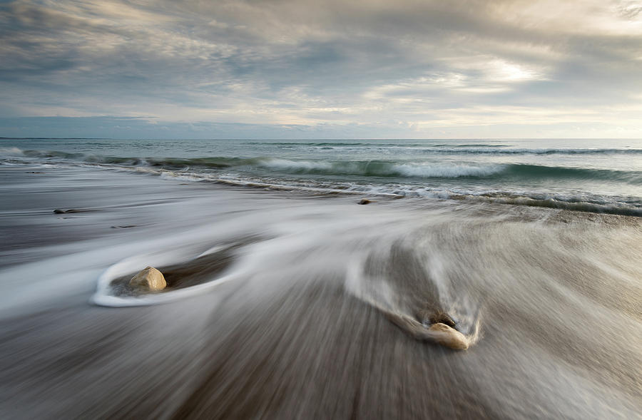 Pebbles in the beach and flowing sea water #3 Photograph by Michalakis Ppalis