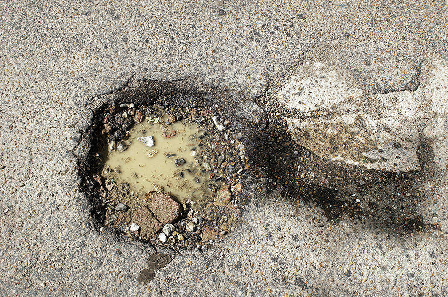 Transportation Photograph - Pothole #2 by Tom Gowanlock