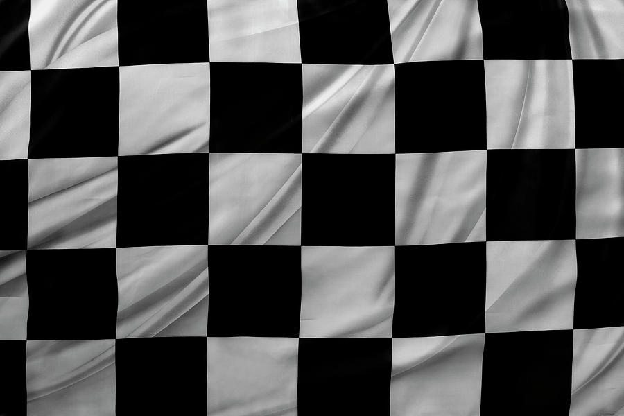 Racing flag #2 Photograph by Les Cunliffe