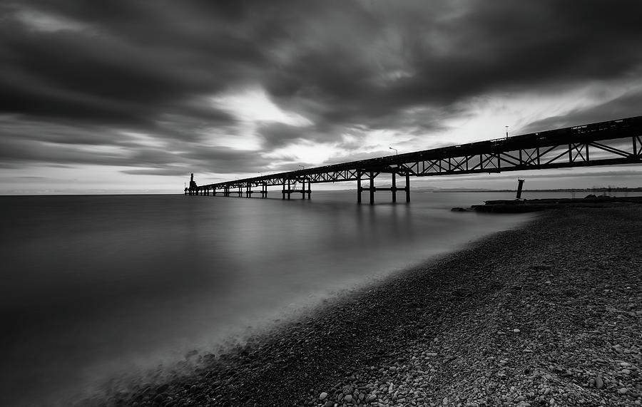Seascape with jetty during a dramatic cloudy sunset #2 Photograph by Michalakis Ppalis