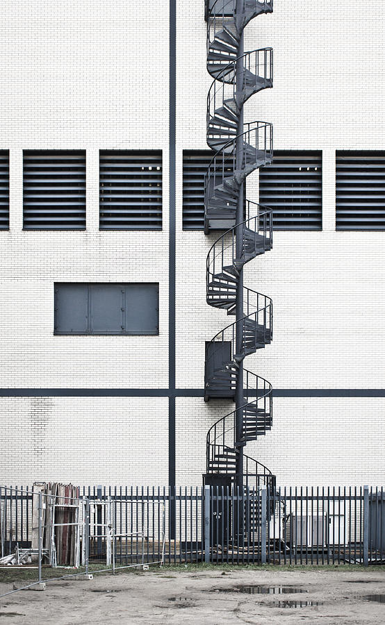 Architecture Photograph - Spiral stairs #2 by Tom Gowanlock