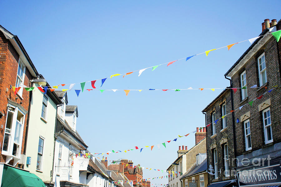 Architecture Photograph - Street bunting flags #2 by Tom Gowanlock