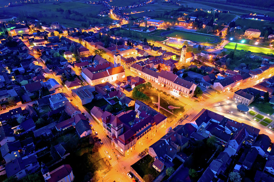 Town of Krizevci aerial panoramic night view #2 Photograph by Brch Photography