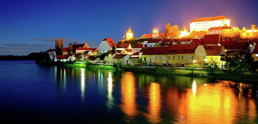 Town of Ptuj and Drava river evening riverfront view #2 Photograph by Brch Photography
