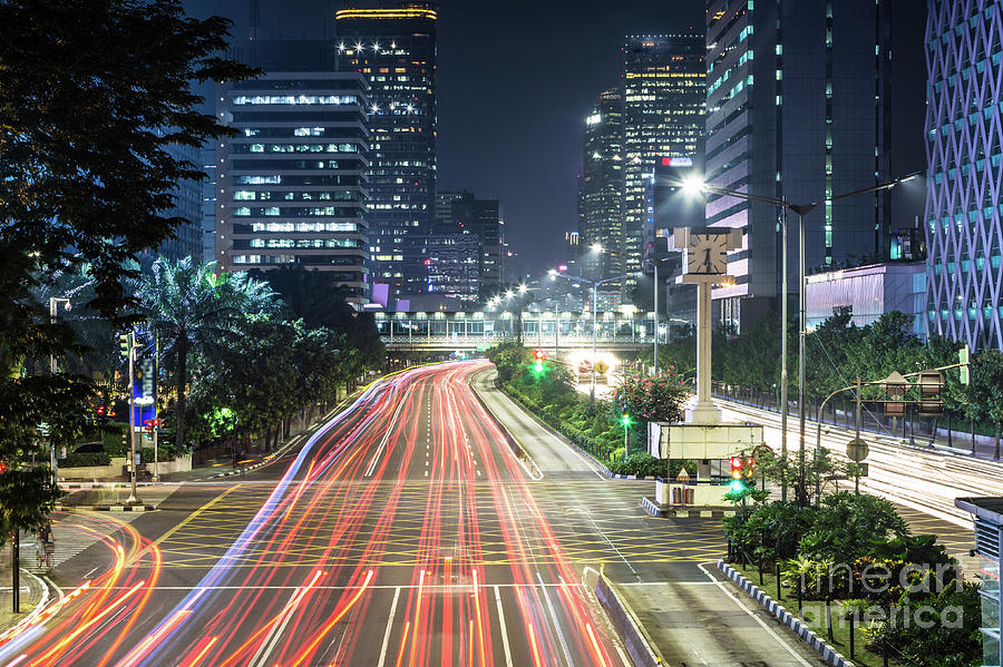 Traffic rush in Jakarta at night #2 Photograph by Didier Marti