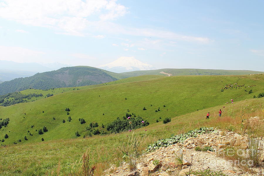 Two Tourists Walk Along The Mountain Path, The Caucasus. Photograph