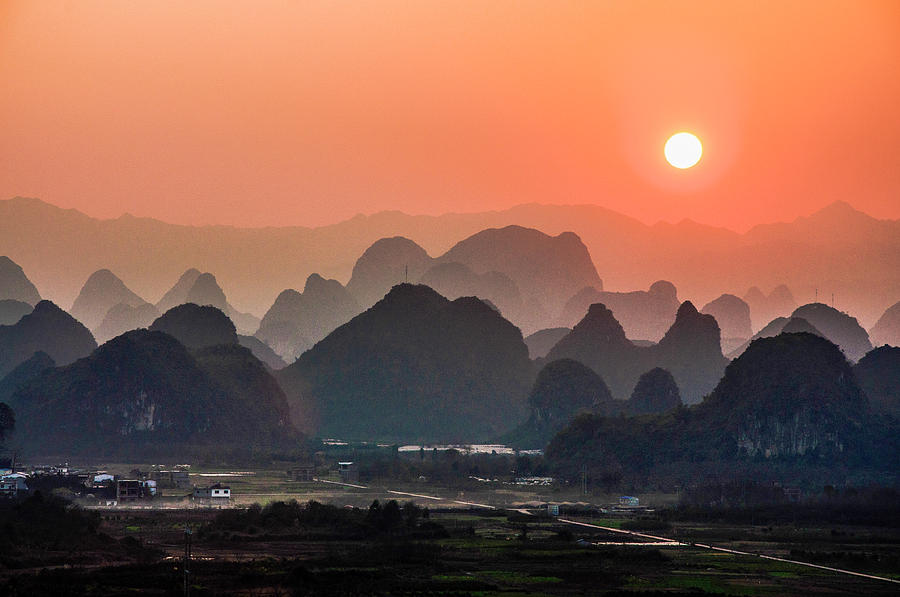 Karst mountains scenery in sunset #20 Photograph by Carl Ning