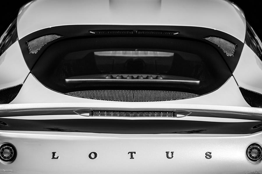 Black And White Photograph - 2011 Lotus Evora S Taillight Emblem -0599bw by Jill Reger