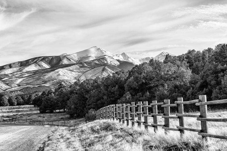 201702180-003K Log-fence-dirt-road 2x3 Photograph by Alan Tonnesen