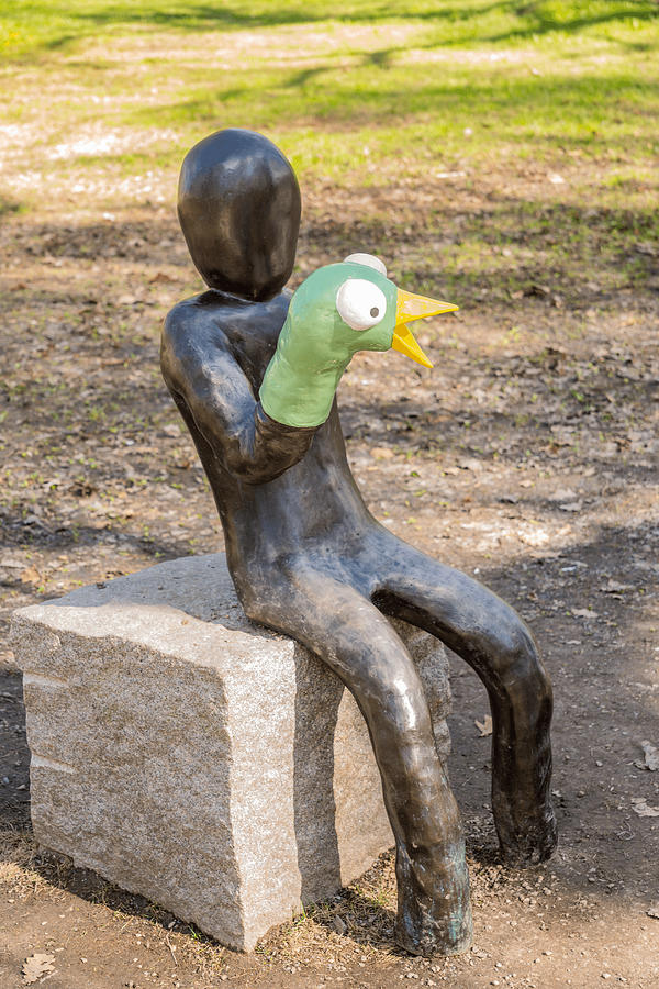 201805040-012 Bronze Child with Hand-puppet Photograph by Alan Tonnesen