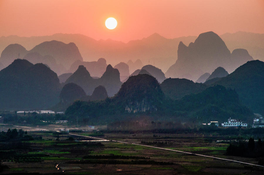 Karst mountains scenery in sunset #21 Photograph by Carl Ning